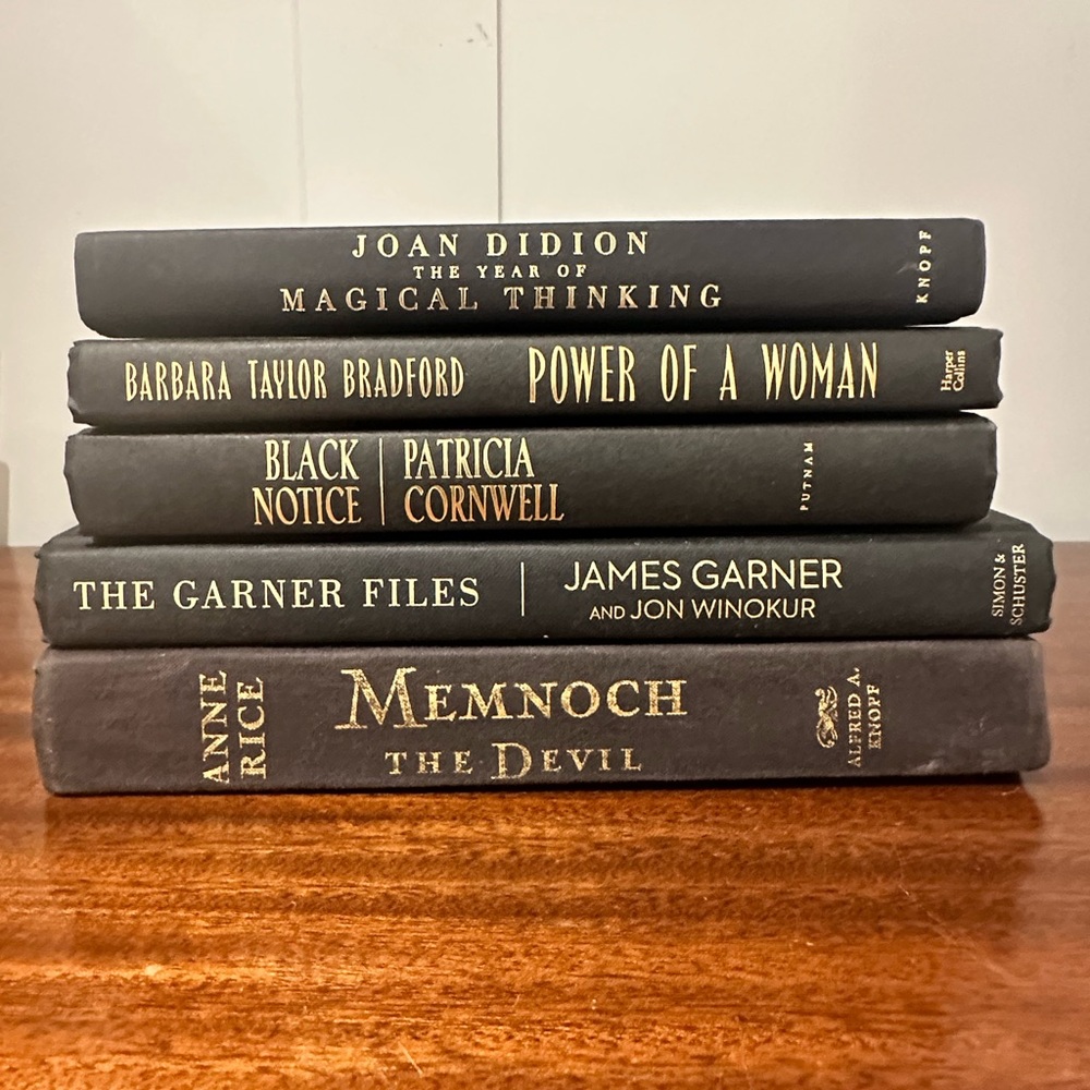 Stack of Black Hardcover Books - Classic Titles